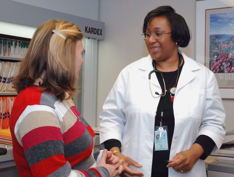 woman consulting her pregnancy with a doctor
