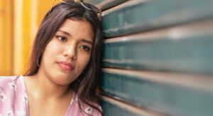 Young woman thinking about how accurate STD tests are