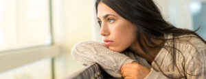 Someone thinking about the side effects of the abortion pill