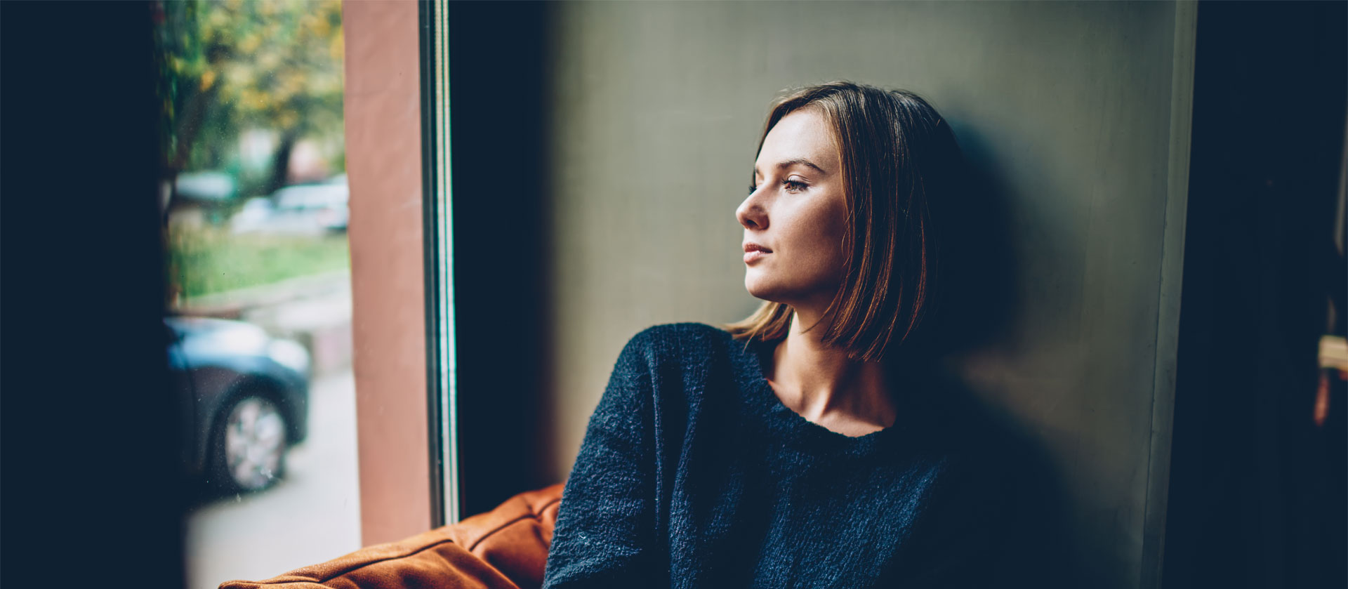 a woman thinking about having an ultrasound to see if she's pregnant